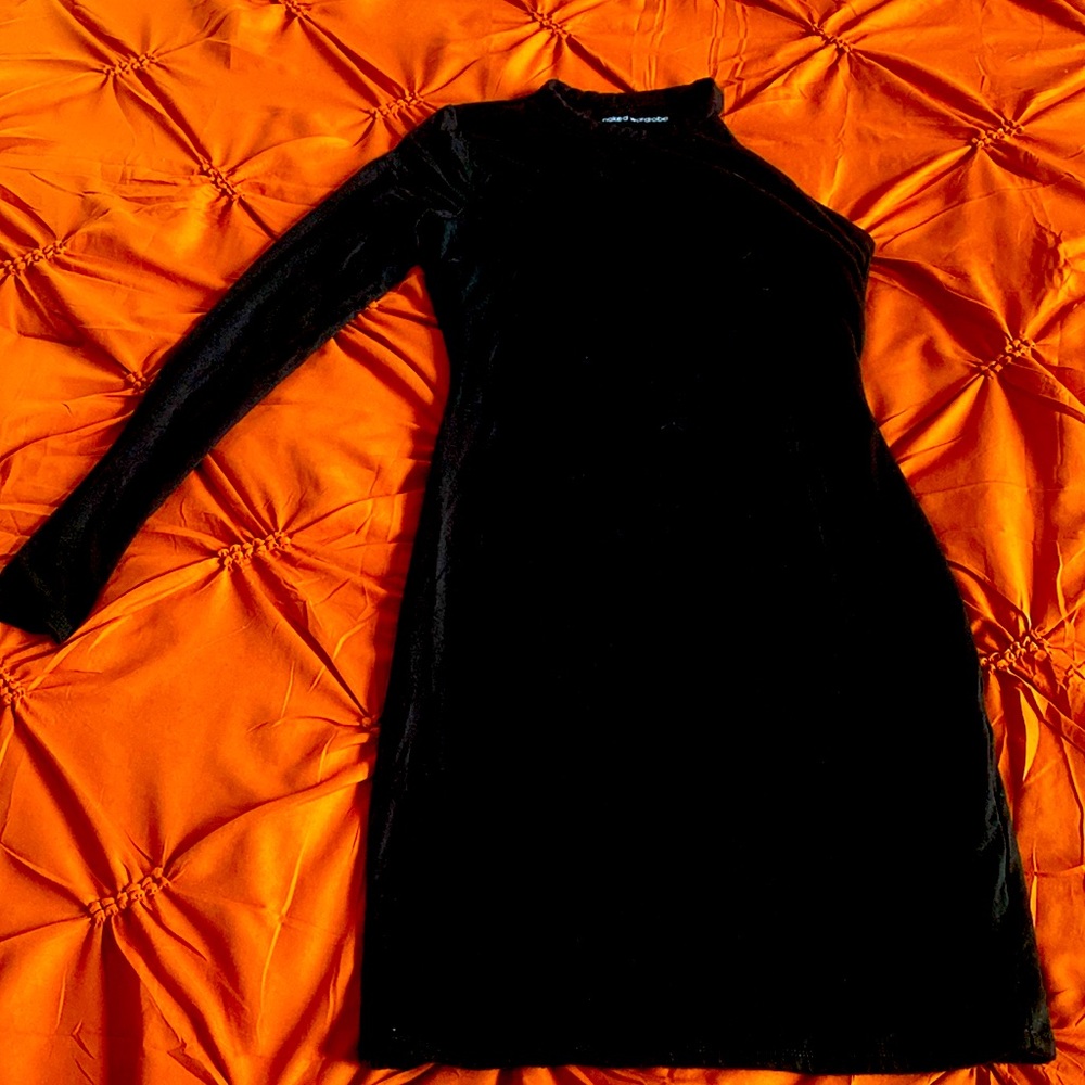 Short black dress by Naked Wardrobe. Asymmetrical body shaper built in